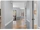 Neutral hallway leads to the dining and living areas with lots of natural light at 3803 Chimney Ridge Pl # 102, Durham, NC 27713