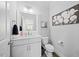 Updated half bathroom featuring single vanity with white cabinets at 3805 Barberry Lake Ct, Fuquay Varina, NC 27526