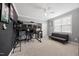 This bedroom features gray walls, ceiling fan, a bunk bed, and desk setup at 3805 Barberry Lake Ct, Fuquay Varina, NC 27526