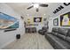 Bonus room is fully furnished with media decor, gray walls, recessed lighting, and ceiling fan at 3805 Barberry Lake Ct, Fuquay Varina, NC 27526
