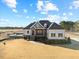 Beautiful home with a manicured lawn, mature trees, and an in-ground pool at 3805 Barberry Lake Ct, Fuquay Varina, NC 27526