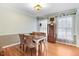 Traditional dining room featuring hardwood floors and neutral wall color at 3836 Gloucester Rd, Rocky Mount, NC 27803