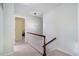 A hallway features carpeted floor and a modern light fixture at 3836 Gloucester Rd, Rocky Mount, NC 27803