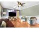 Comfortable living room with hardwood floors and plenty of sunlight at 3836 Gloucester Rd, Rocky Mount, NC 27803