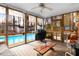 Screened porch offers a pool view, an outdoor grill, and natural light at 3836 Gloucester Rd, Rocky Mount, NC 27803