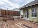 Back deck has plenty of space with wooden bench seating and is shaded by an awning at 426 Fincastle Dr, Cary, NC 27513
