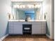 Stylish bathroom boasts dual sinks, decorative mirrors, vanity space, and ample drawer space at 426 Fincastle Dr, Cary, NC 27513