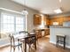 Cozy dining area featuring wood floors, a window seat, and ample natural light at 426 Fincastle Dr, Cary, NC 27513
