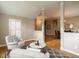 Comfortable living room with chairs, rug, windows, and hardwood flooring at 426 Fincastle Dr, Cary, NC 27513