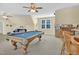 Bonus room with pool table, bar, and seating at 498 Mountain Laurel, Chapel Hill, NC 27517
