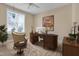 Inviting office space with a large desk, comfortable chair, and plenty of natural light from the window at 498 Mountain Laurel, Chapel Hill, NC 27517