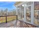 Enclosed porch area with screened windows and door, with golf course view at 498 Mountain Laurel, Chapel Hill, NC 27517
