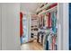 Walk-in closet with custom shelving and clothing racks at 520 Log Barn Rd, Pittsboro, NC 27312