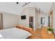 Cozy main bedroom featuring hardwood floors, a ceiling fan, and a walk-in closet at 520 Log Barn Rd, Pittsboro, NC 27312