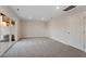Spacious basement featuring carpet and a door to the backyard at 5322 River Reach Dr, Raleigh, NC 27616