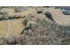 An overhead shot highlights the property's layout, expansive grounds, and beautiful natural surroundings at 5436 New Oak Trl, Burlington, NC 27217