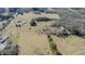 The property offers scenic views and a tranquil setting, as showcased in this aerial shot of the land at 5436 New Oak Trl, Burlington, NC 27217