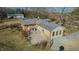 Aerial view showcases the home's backyard, concrete patio, and overall property layout at 5436 New Oak Trl, Burlington, NC 27217