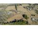 An elevated view of the property reveals its dimensions, landscaping, and proximity to nearby amenities at 5436 New Oak Trl, Burlington, NC 27217