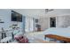 Modern bedroom with hardwood floors, exposed brick, patio access, and a music-themed decor at 5436 New Oak Trl, Burlington, NC 27217