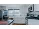 Charming kitchen with stainless steel appliances and white marble countertops at 5436 New Oak Trl, Burlington, NC 27217