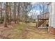 Spacious backyard with deck and stairs, perfect for outdoor entertaining and relaxation at 7 Harrigan Ct, Durham, NC 27705
