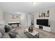 Finished basement features a living area, pool table, and access to the upper level at 7 Harrigan Ct, Durham, NC 27705