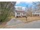 Charming two-story home with a well-maintained yard and driveway for easy access at 7 Harrigan Ct, Durham, NC 27705