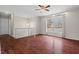 Spacious and bright living room with hardwood floors and a large window at 7 Harrigan Ct, Durham, NC 27705