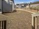 A large backyard space enclosed by an iron fence for a secure outdoor space at 705 Vine Pkwy, Pittsboro, NC 27312