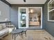 Covered porch with sliding door and outdoor seating, perfect for relaxing outdoors at 705 Vine Pkwy, Pittsboro, NC 27312