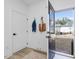 Welcoming entryway featuring a door, coat hooks, and easy access to the outdoors and the rest of the house at 705 Vine Pkwy, Pittsboro, NC 27312