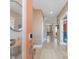 Bright and inviting entryway featuring hardwood floors, modern decor, and seamless flow into the home at 705 Vine Pkwy, Pittsboro, NC 27312