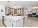Open kitchen and breakfast nook featuring a white table and chairs at 705 Vine Pkwy, Pittsboro, NC 27312