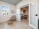 Bright office featuring two-tone paint, natural light, chair, and entry to a second office at 705 Vine Pkwy, Pittsboro, NC 27312