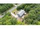Overhead shot featuring the house, driveway, and manicured landscaping within a wooded setting at 766 Horizon Dr, Pittsboro, NC 27312