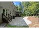 Stone patio, wood burning fire pit and screened-in porch provides the perfect outdoor space at 766 Horizon Dr, Pittsboro, NC 27312
