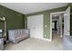 Bedroom showcasing a crib and plentiful storage at 766 Horizon Dr, Pittsboro, NC 27312