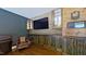 A room for entertaining with hardwood floors, stylish bar area with beautiful wood trim at 766 Horizon Dr, Pittsboro, NC 27312