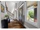 Grand entryway boasts hardwood floors, staircase, and natural light at 766 Horizon Dr, Pittsboro, NC 27312