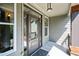 A charming front entry door with sidelights and overhead transom at 766 Horizon Dr, Pittsboro, NC 27312