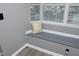 Bay window featuring built in bench and pillow for comfortable sitting at 7736 Falcon Rest Cir, Raleigh, NC 27615
