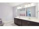 Spacious bathroom featuring double sink vanity, and walk in shower at 7880 Flower Hill Rd, Middlesex, NC 27557