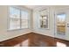 This sunny bedroom has a window and access to the outside patio at 8008 Hergety Dr, Raleigh, NC 27603