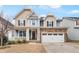 Charming two-story home with stone accents, covered porch, and a two-car garage at 8008 Hergety Dr, Raleigh, NC 27603