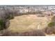 Aerial shot of common neighborhood field, including walking trails and green spaces at 8008 Hergety Dr, Raleigh, NC 27603