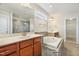 Main bathroom with tub and tiled shower at 8008 Hergety Dr, Raleigh, NC 27603