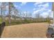 Expansive backyard with new grass and black aluminum fence, perfect for outdoor activities and pets at 824 Wrights Creek Way, Wake Forest, NC 27587