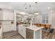 Bright, open-concept kitchen flowing to a dining area and living room at 824 Wrights Creek Way, Wake Forest, NC 27587