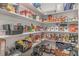 A well-stocked pantry offers ample storage with organized shelves and varied food items at 824 Wrights Creek Way, Wake Forest, NC 27587